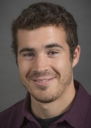 A portrait of Nathan Huizinga of the Department of Occupational and Environmental Health in the College of Public Health at the University of Iowa.