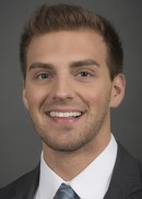 A portrait of George Tzanetakos of the Department of Health Management and Policy in the College of Public Health at the University of Iowa.