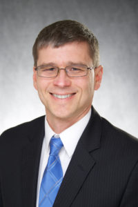 Portrait of Scot Reisinger, director of student services at the University of Iowa College of Public Health