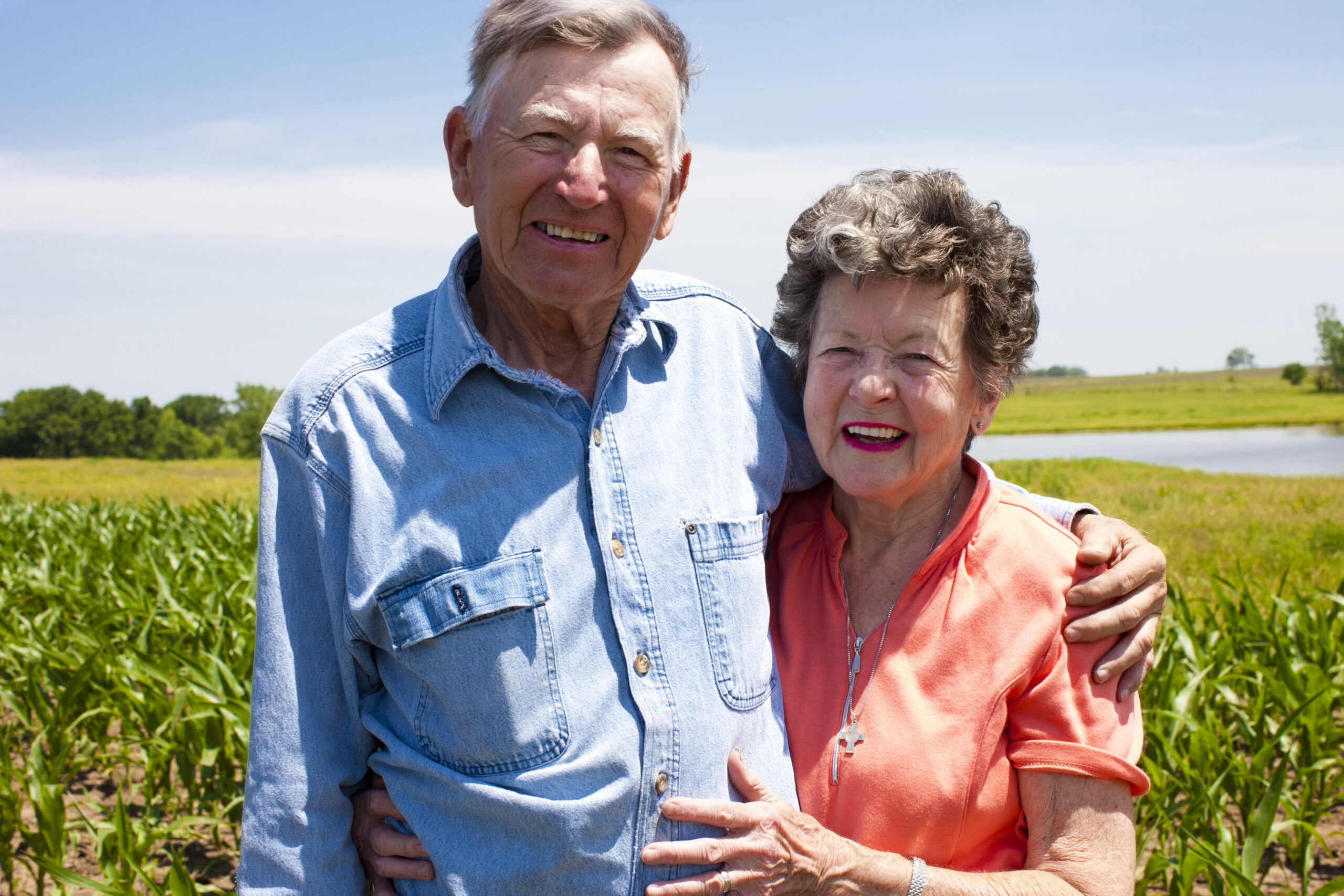 older adult farm couple outdoors