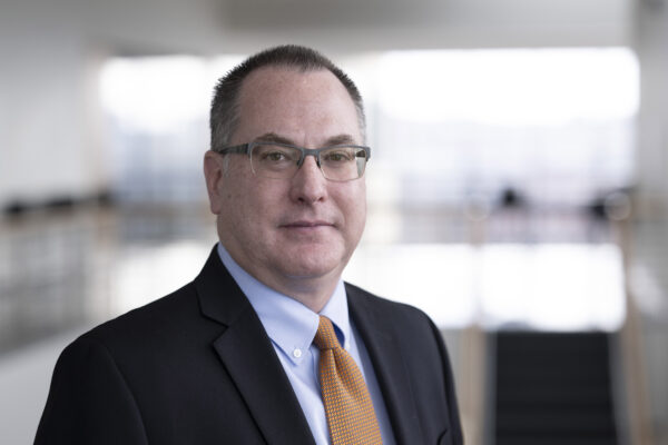 Portrait of Chris Coffey, professor of biostatistics and director of the Clinical Trials Statistical and Data Management Center at the University of Iowa College of Public Health.