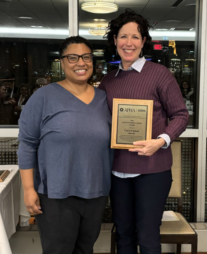 Carri Casteel receiving the 2024 Distinguished Career Award with Renee Johnson, Chair of the Injury Control and Emergency Health Services Section of APHA.