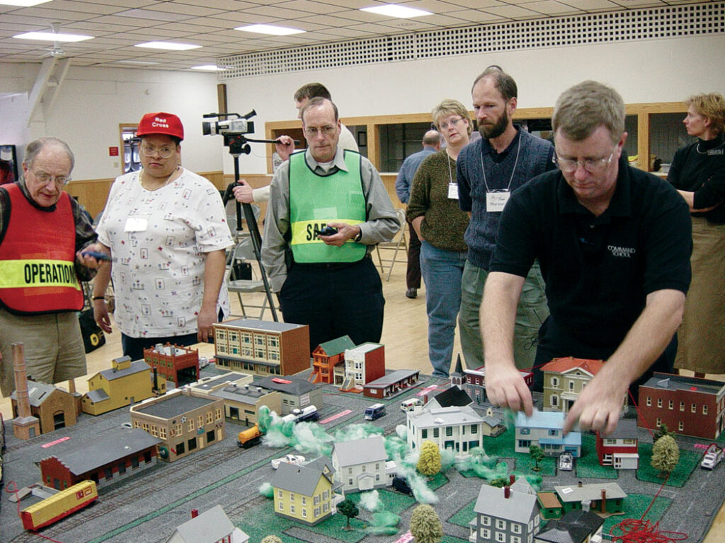 participants simulate a disaster response during a tabletop preparedness exercise in 2011