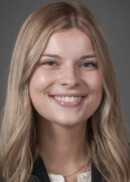 A portrait of Madison Anderson of the Department of Health Management and Policy at the University of Iowa College of Public Health.