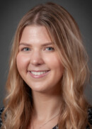 A portrait of Grace Carlson of the Department of Community and Behavioral Health at the University of Iowa College of Public Health.