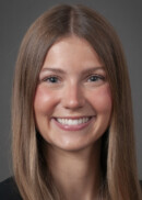 A portrait of Nicole Holdgrafer of the Department of Health Management and Policy at the University of Iowa College of Public Health.