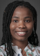 A portrait of Faith Ibitoye of the Department of Community and Behavioral Health at the University of Iowa College of Public Health.