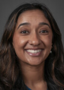 A portrait of Ackem Pangli of the Department of Health Management and Policy at the University of Iowa College of Public Health.