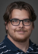 A portrait of Matthew Saylor of the Department of Occupational and Environmental Health at the University of Iowa College of Public Health.