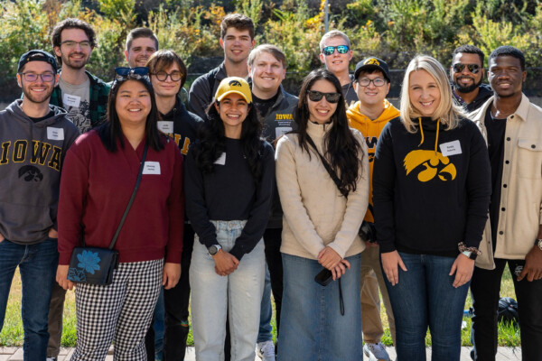 Students, alumni, and faculty posing at the 2024 College of Public Health Homecoming Lunch.